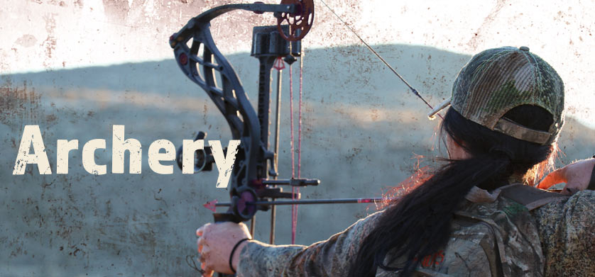 woman-shooting-compound-bow-while-hunting